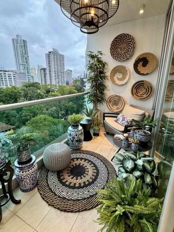Private balcony overlooking the Pacific Ocean and skyline at PH Costanera Panama City