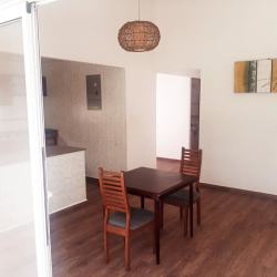 Outdoor pool with lounge deck surrounded by landscaped gardens in PH Campiña Vista Alegre