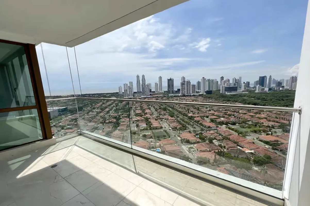 Elegant open plan dining and living area with panoramic city views at PH The Colonial Santa Maria Panama