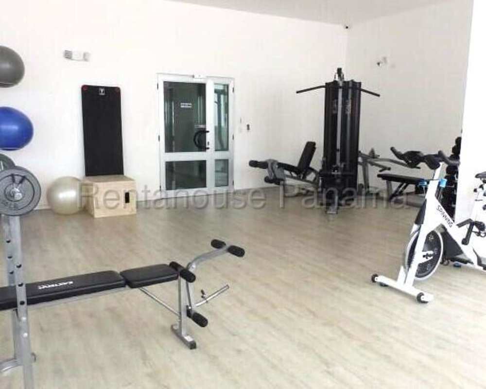 Fully equipped gym with exercise machines PH Roma Tower rental apartment in San Francisco Panama