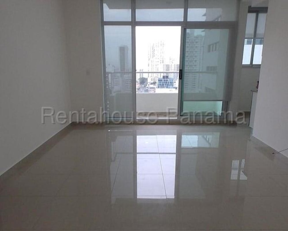 Open-plan living dining with balcony access in PH Roma Tower San Francisco Panama