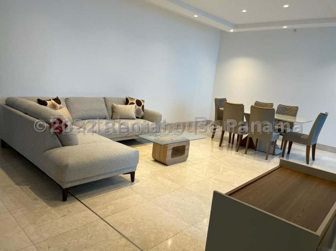 Modern dining area with six chairs in luxury apartment at PH Deluxe Residences Punta Paitilla