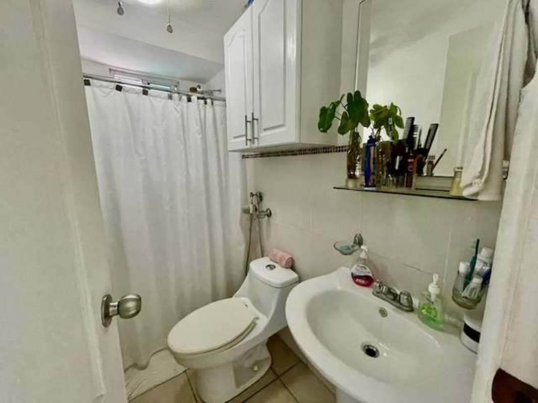 Swimming pool with children playground Parque Lefevre Panama city apartment complex