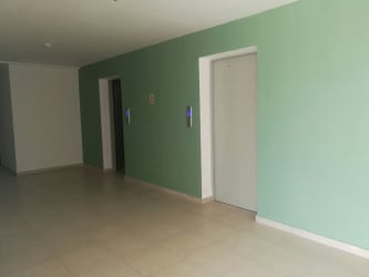 Minimalist lobby with two elevators PH Ocean View Playa Corona Panama