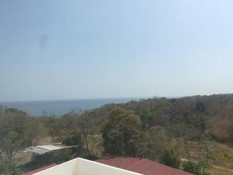 Contemporary bathroom with beige tile, walk-in shower PH Ocean View Panama