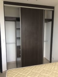 Modern kitchen with granite countertop, dark cabinets PH Ocean View Playa Corona Panama