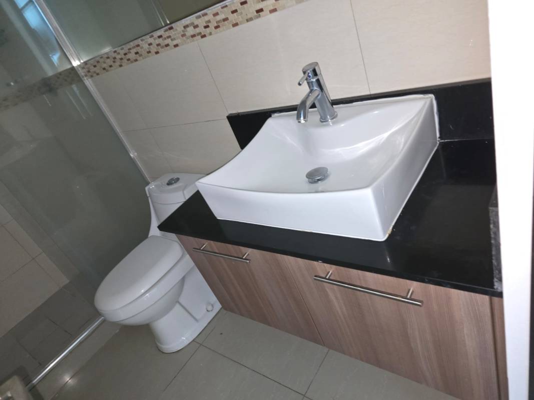 Modern bathroom with vessel sink granite vanity glass shower PH Diamond Tower Panama