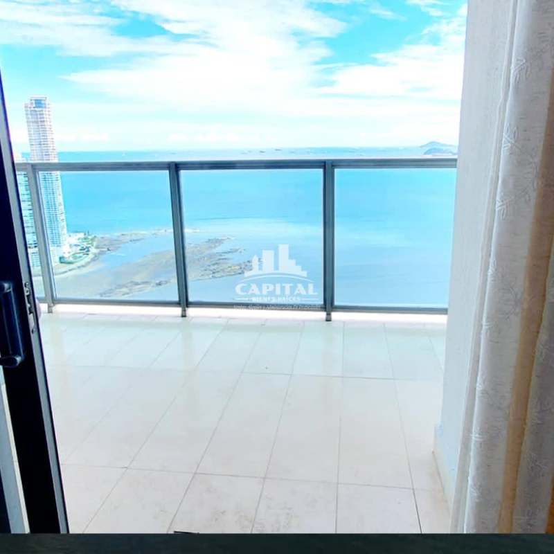 High-rise apartment balcony with panoramic bay view in PH Arts & Yoo Avenida Balboa Panama City