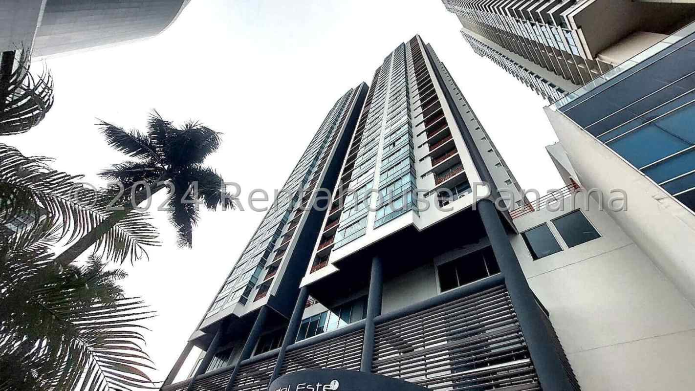 Spacious bedroom with large window and city view at PH Sol del Este Costa del Este Panama