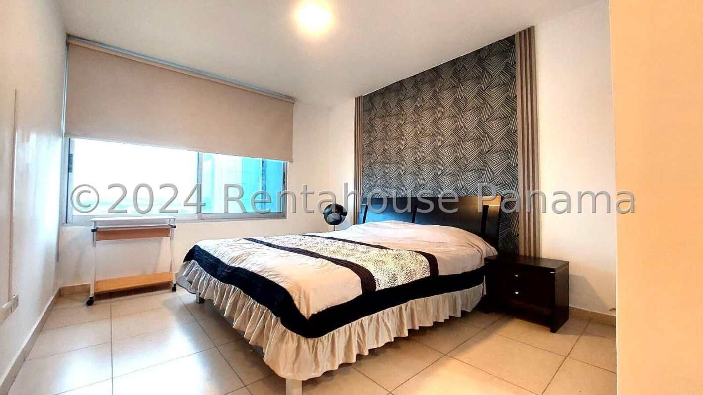 Kitchen with granite counters, wood cabinets, appliances PH Sol del Este Costa del Este