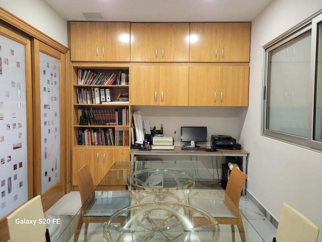 Compact commercial bathroom with mosaic tile PH Plaza San Francisco Panama