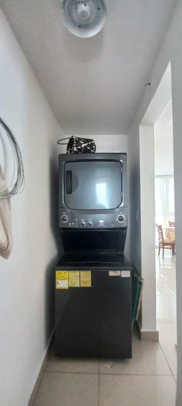 Laundry area with washer and gas dryer PH Carrasquilla Park Panama City