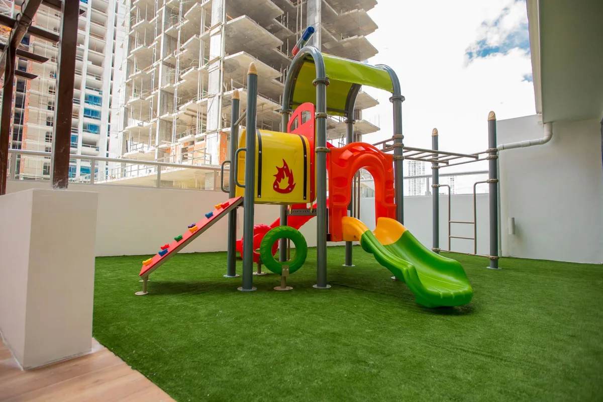 Modern children's playground with slides and jungle gym PH Carrasquilla Park Panama City