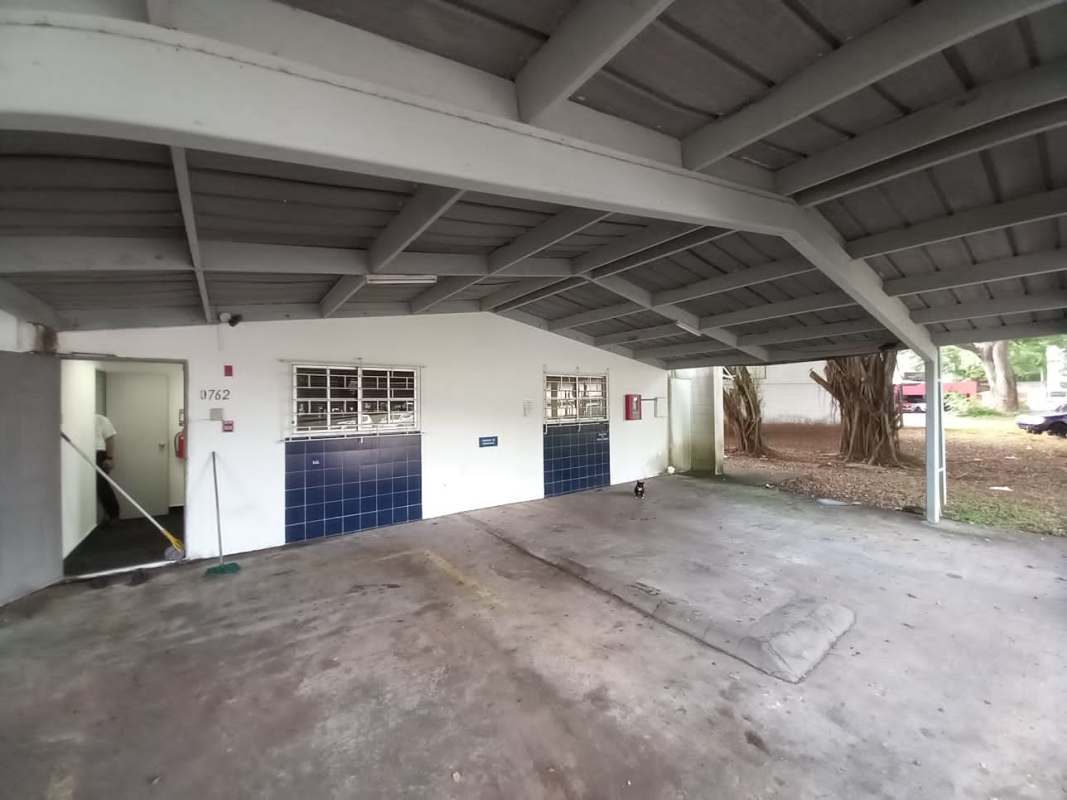 Ample covered parking with metal roof and garden view commercial property near Panama Canal