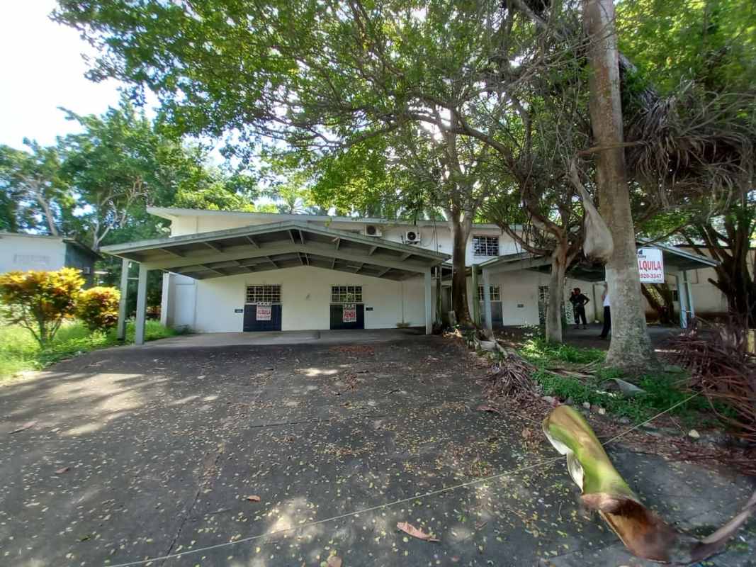 Interior large office room with workstations bright natural light La Boca Balboa Panama