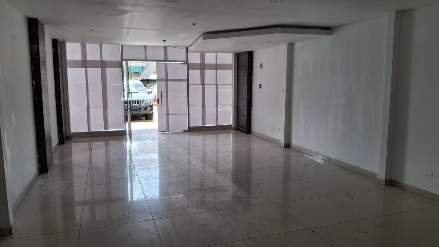 Empty retail or office interior with tile floors, large windows in Condado Business Center Condado del Rey