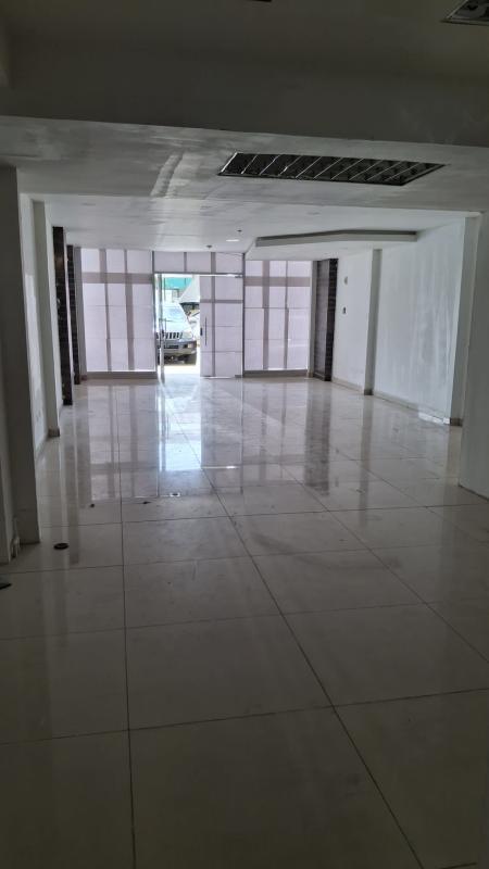 Spacious commercial interior lobby with tile floor and glass doors in Condado Business Center Panama