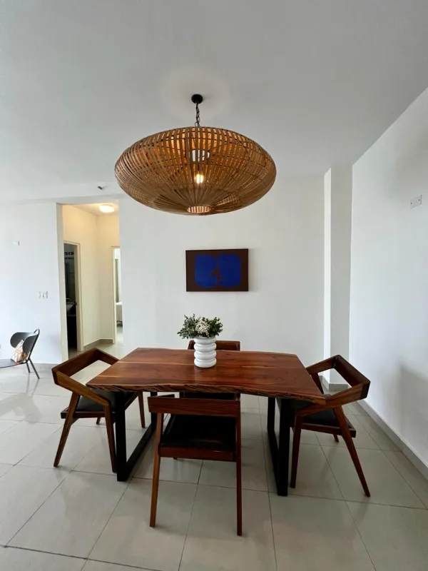 Dining area minimalist with pendant light, wood furniture, PH Latorraca Panama