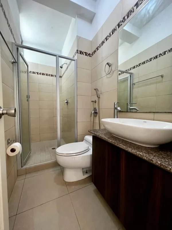 Contemporary bathroom with glass shower, granite top, vessel sink in PH Latorraca Panama