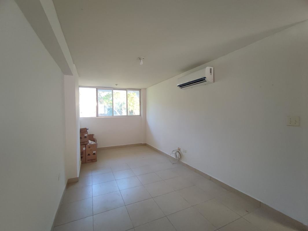Bedroom with large window, built-in shelves, split AC PH Bella Vista Gardens Panama City