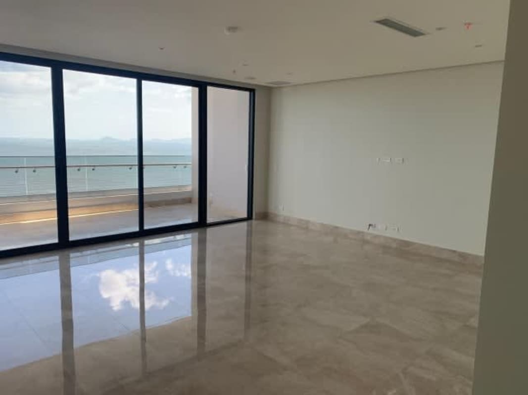 Spacious modern kitchen with island, marble countertops, stainless appliances in PH Serenissima Costa del Este Panama