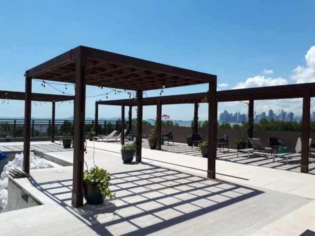 Modern glass tower facade of PH Serenissima luxury condominium in Panama City Costa del Este