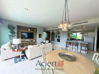 Modern kitchen with breakfast bar in Bahia Punta Barco beachfront apartment Panama