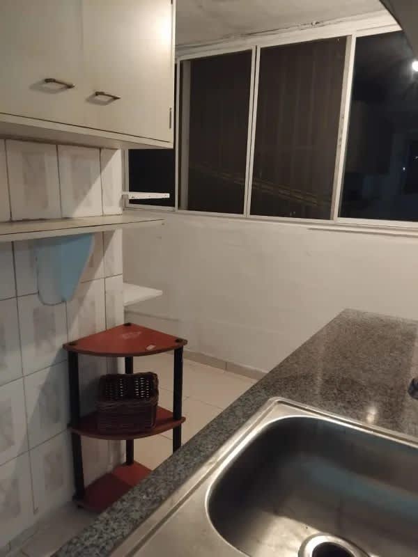 Multi-story apartment complex exterior view with parking and mature trees in Betania Tumba Muerto Panama