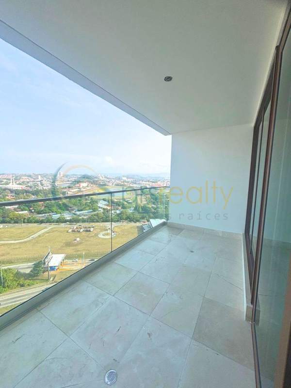 Luxury rooftop infinity pool with sun loungers overlooking Panama City skyline in Santa Maria Country Club