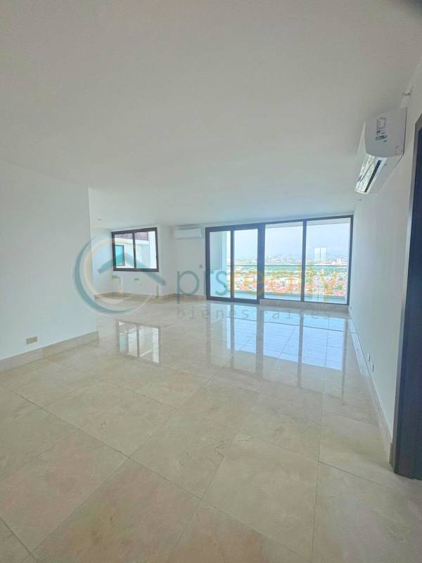 Covered large balcony with tile floors and urban views in Santa Maria luxury condo Panama