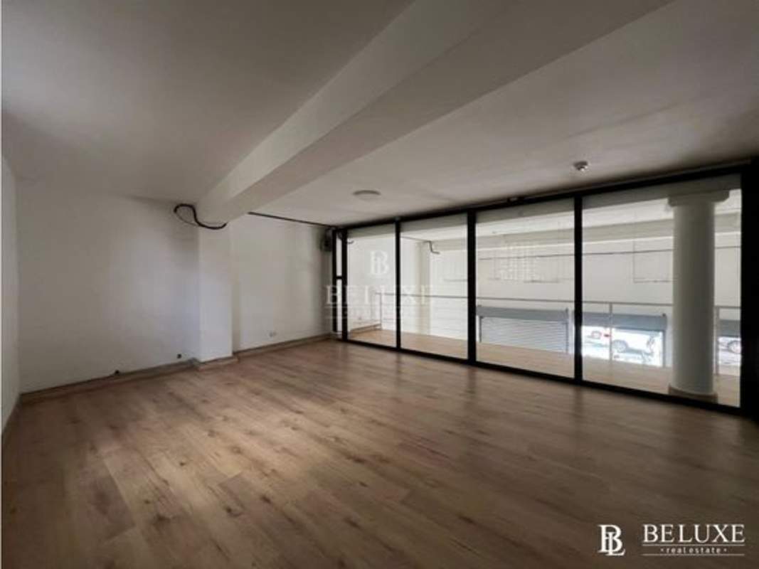 Private offices on mezzanine level inside commercial space with glass walls Via Brasil Panama