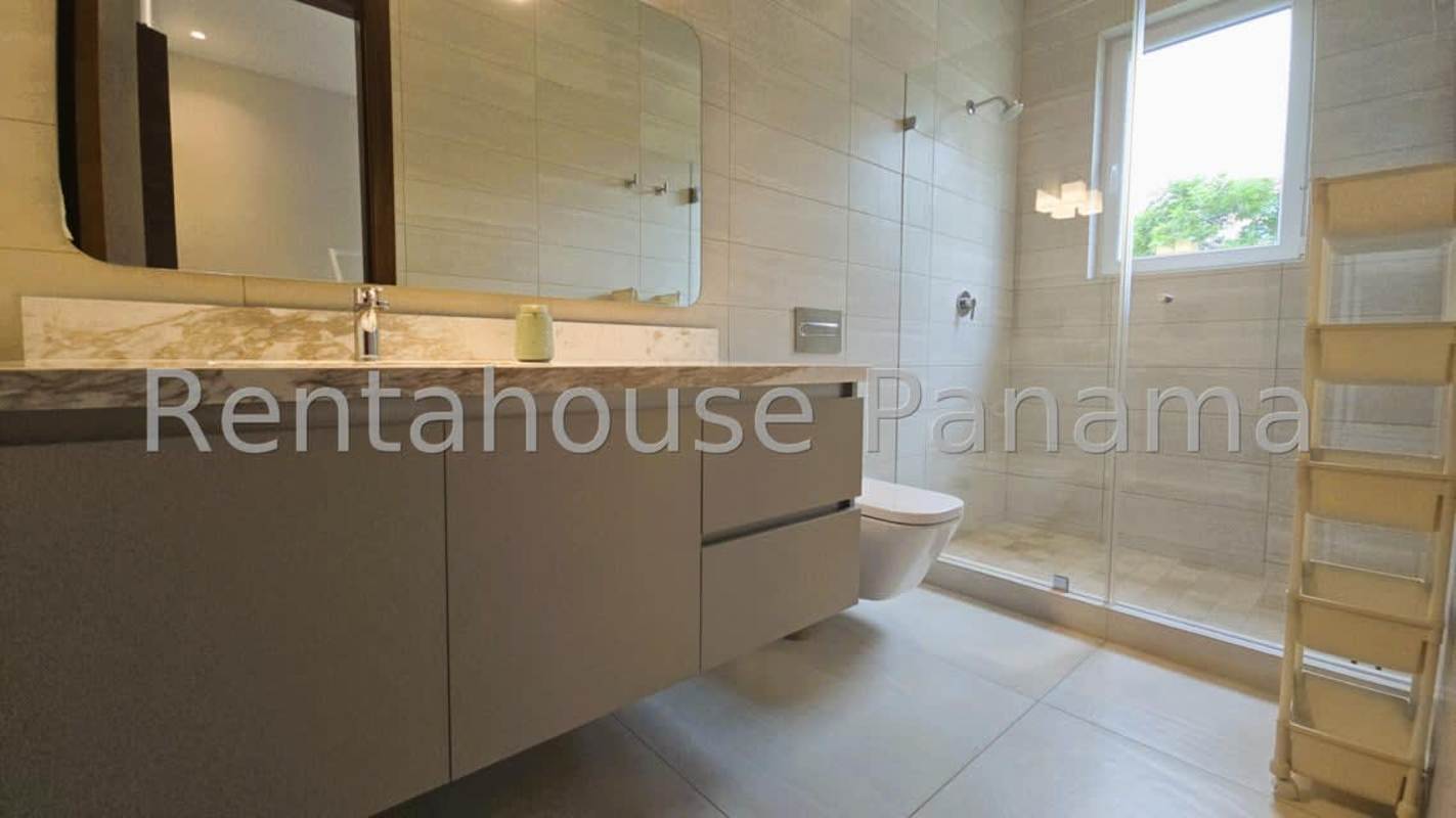 Private covered outdoor terrace perfect for entertaining in exclusive Santa María golf community home Panama City