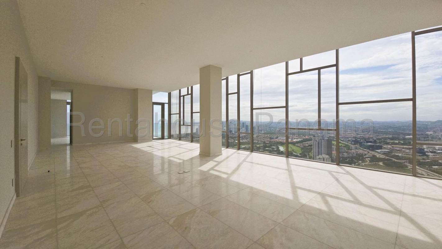 Spacious penthouse living room with marble floors, floor-to-ceiling windows overlooking golf course and city skyline in Santa Maria Panama