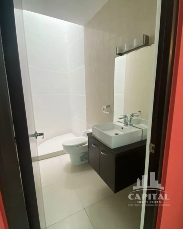 Luxurious bathroom with double sink vanity and modern fixtures at Costa Sur Panama