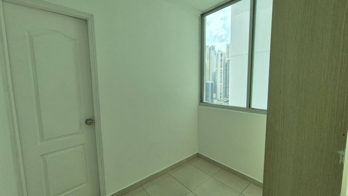 Bedroom featuring built-in wardrobe, tile flooring, air conditioning in PH Bella Vista Panama City