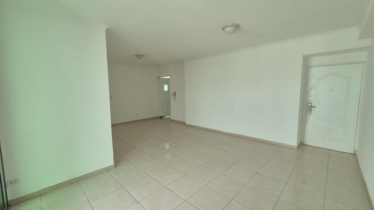 Modern laundry room with water heater, sink, exposed plumbing in Bella Vista apartment Panama
