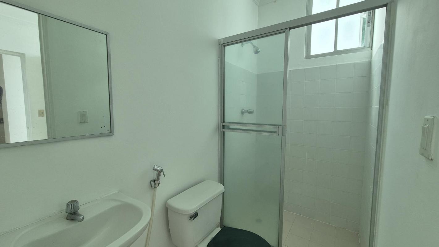 Laundry with utility sink, water heater, window PH Bella Vista Panama apartment