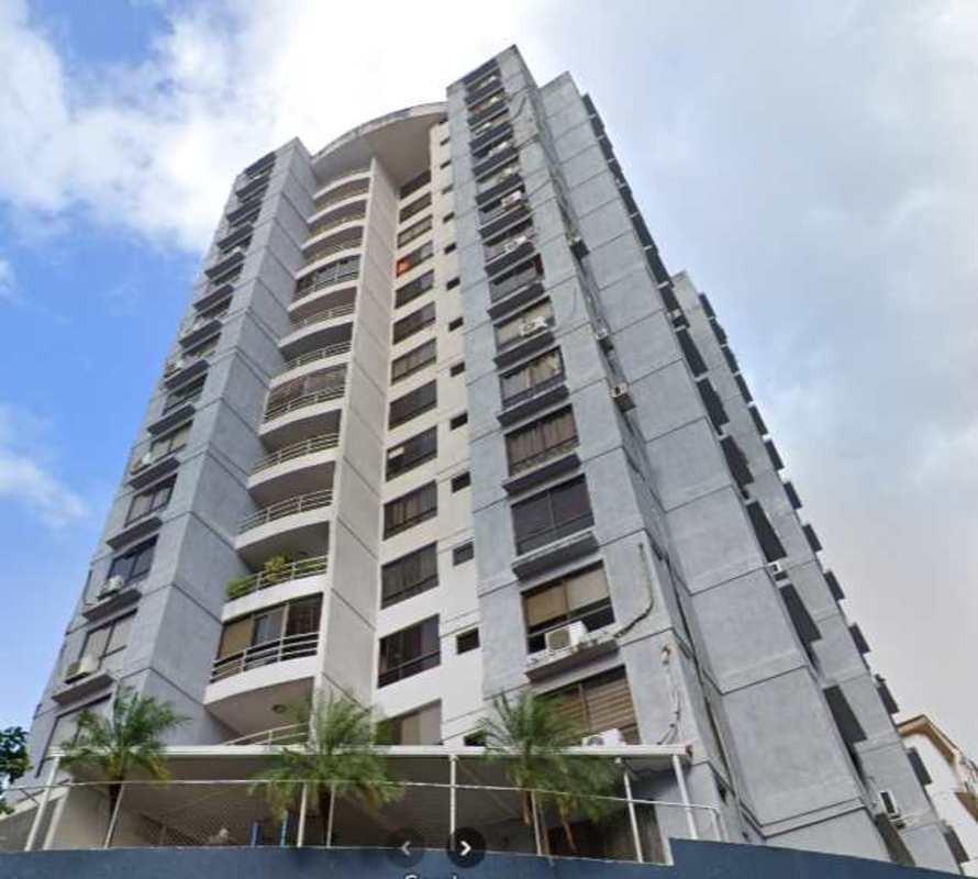 Kitchen with granite counters, gas stove and white cabinets PH Edison Park Panama City