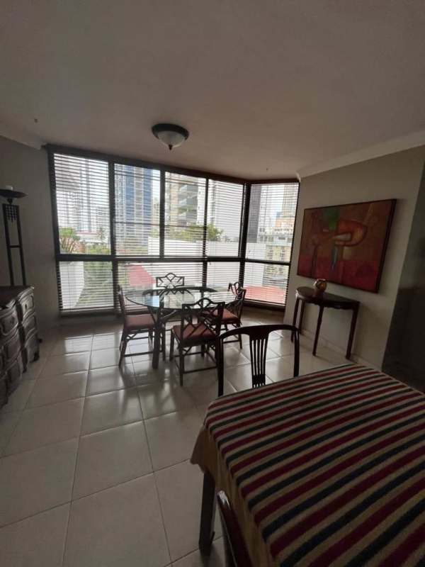 Modern dining area with corner windows and skyline view PH Riviera del Mar in Coco del Mar Panama City