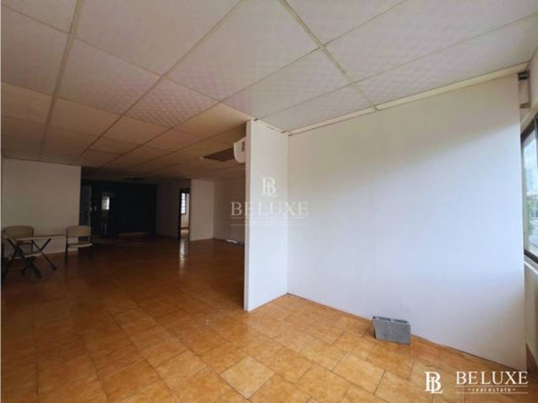 Large commercial office interior in Via Brasil business center with tiled floors