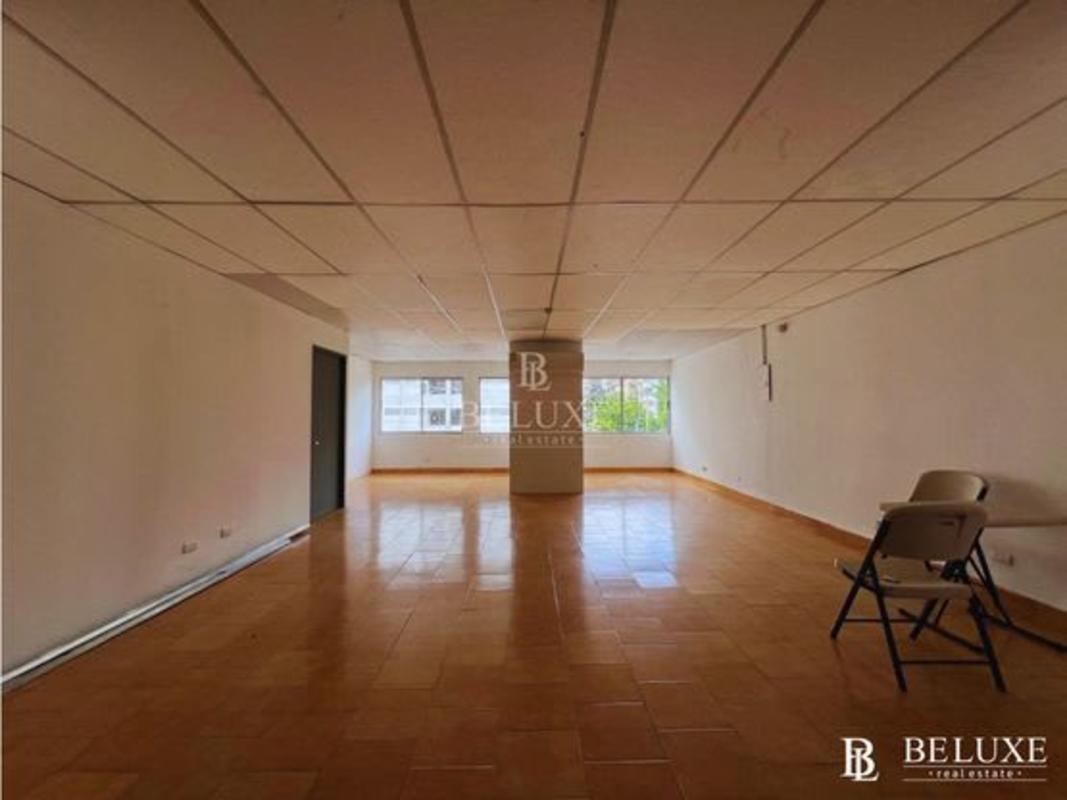 Partitioned office area with tiled flooring and bright lighting in PH Via Brasil Tower