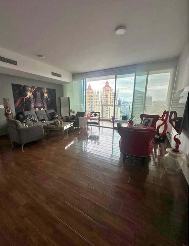 Modern balcony with glass rail providing panoramic views of Panama City skyline from PH Pacific Point