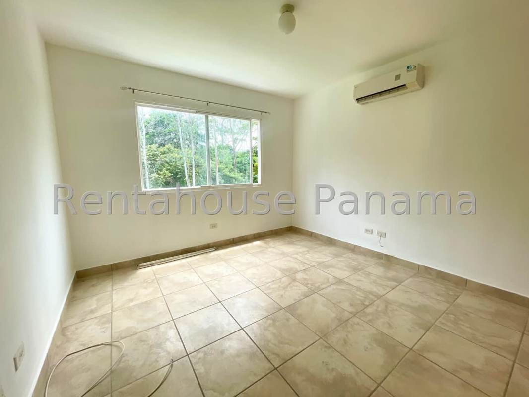 Contemporary kitchen with tile floor and dark cabinetry PH Everest Panama