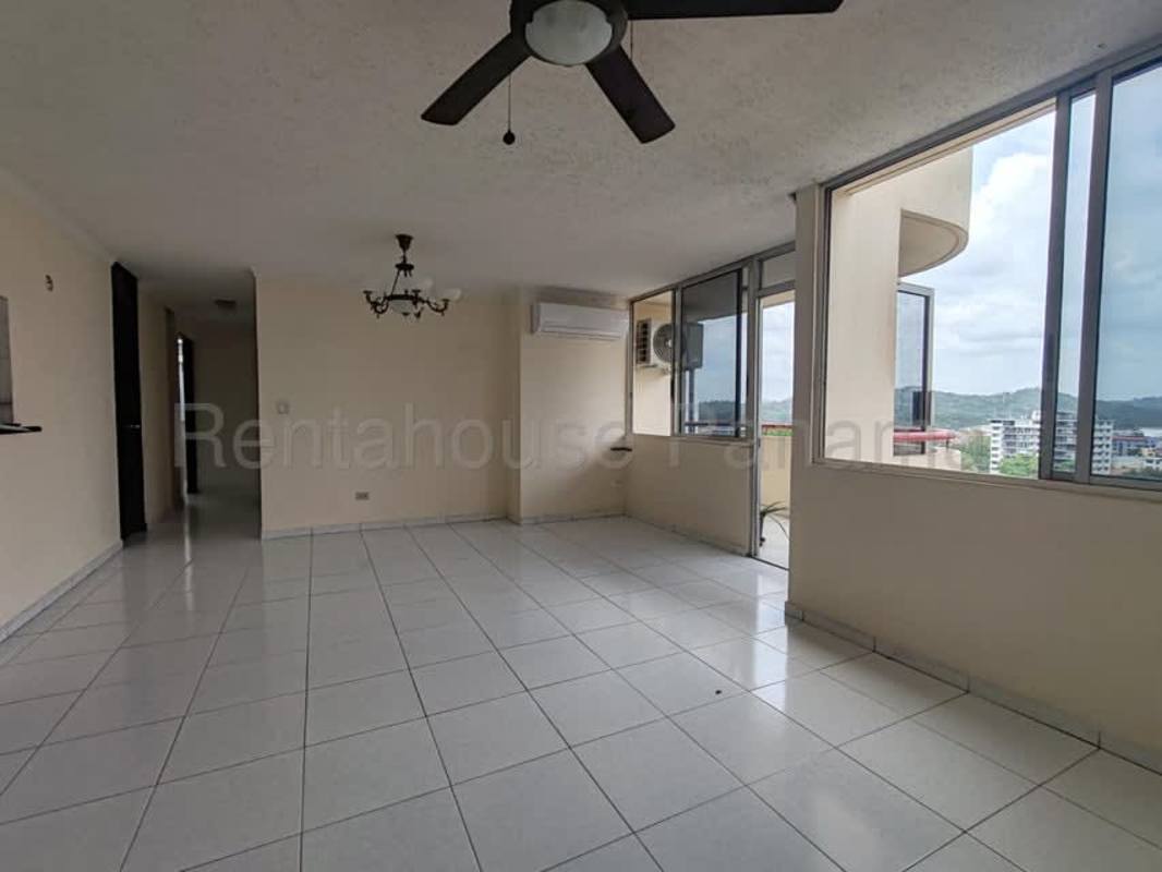 Living room with balcony access, ceiling fan, tiled floors PH El Cangrejo Panama