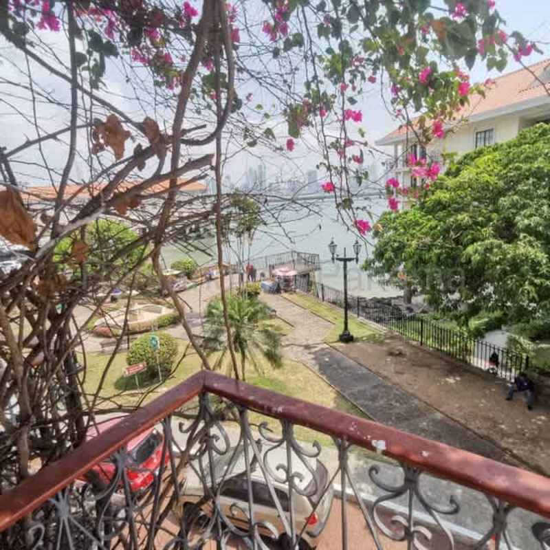 Waterfront view from colonial balcony with gardens Casco Viejo Panama