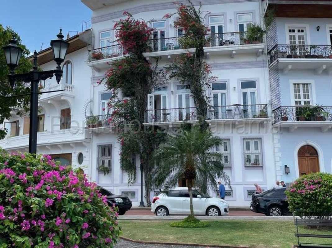 Colonial style building with balconies and flowering vines Casco Viejo Panama City
