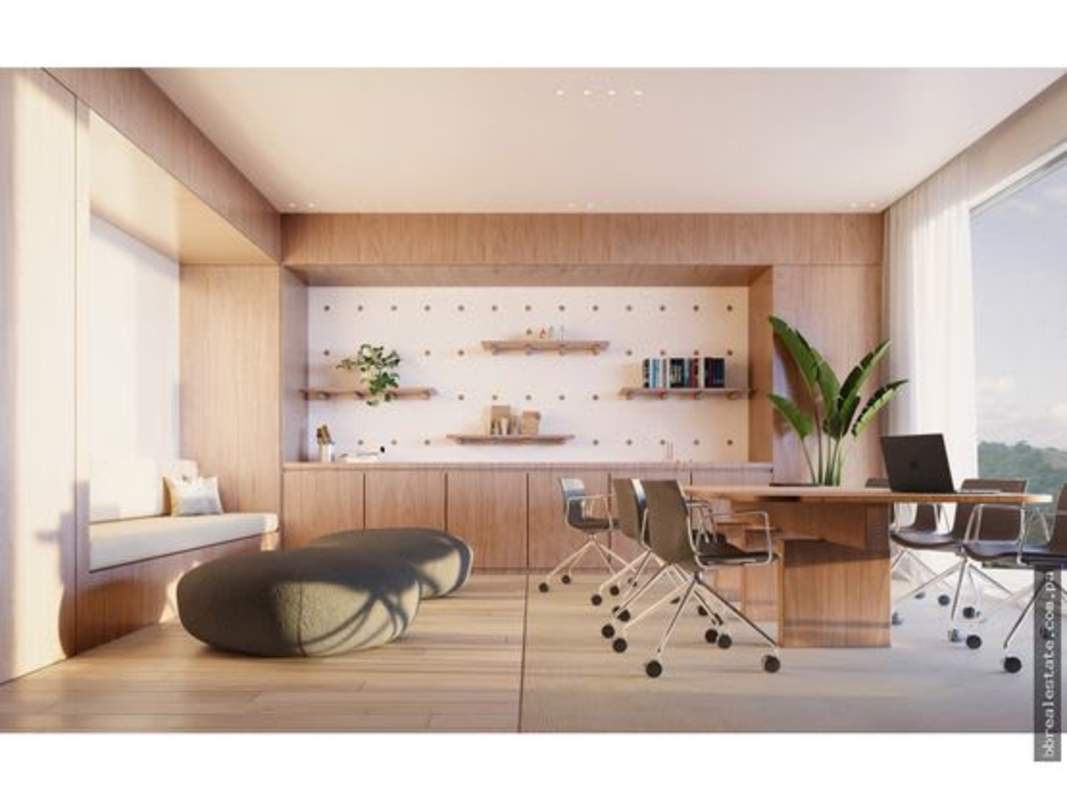 Modern coworking space and lounge with light wood finishes at PH Nautilus Panama