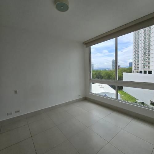 Contemporary open kitchen with granite countertops and appliances in PH Bali apartment Costa del Este