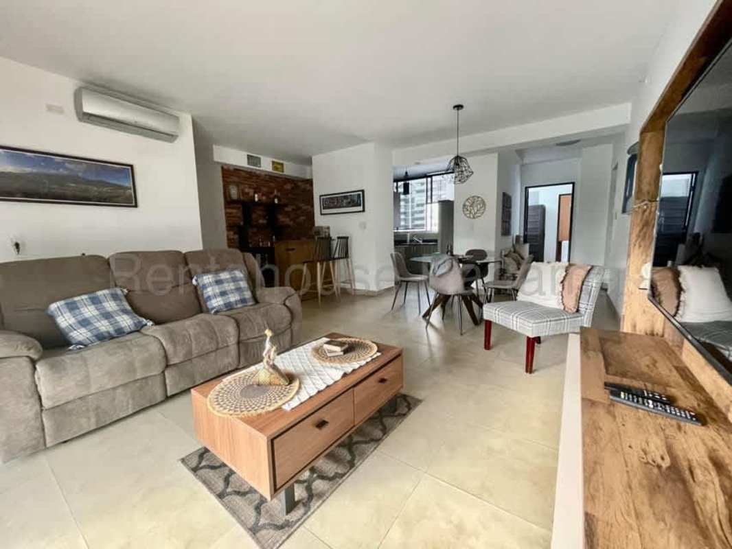 Open living dining area with balcony access city views porcelain floors PH San Francisco JG Panama