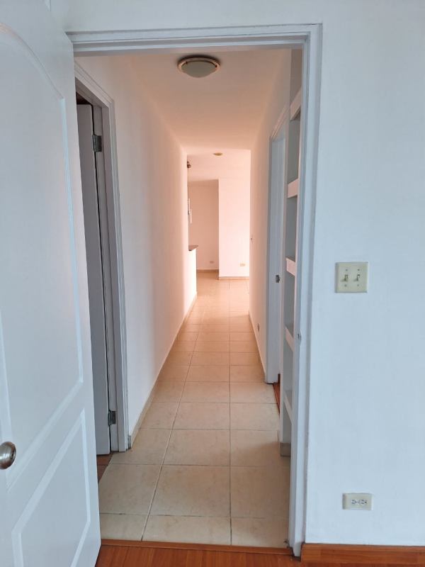 Bedroom with large window, air conditioning, and city views PH San Francisco Bay Panama